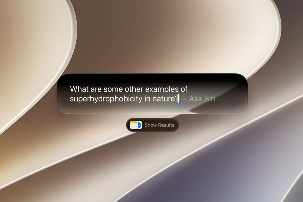 Siri AI answering a question directly inside Spotlight on a Mac, as taken from Apple